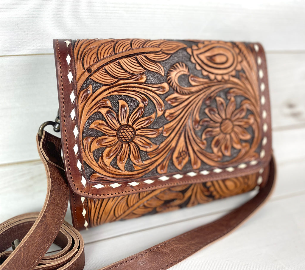 Tooled leather hot sale clutch